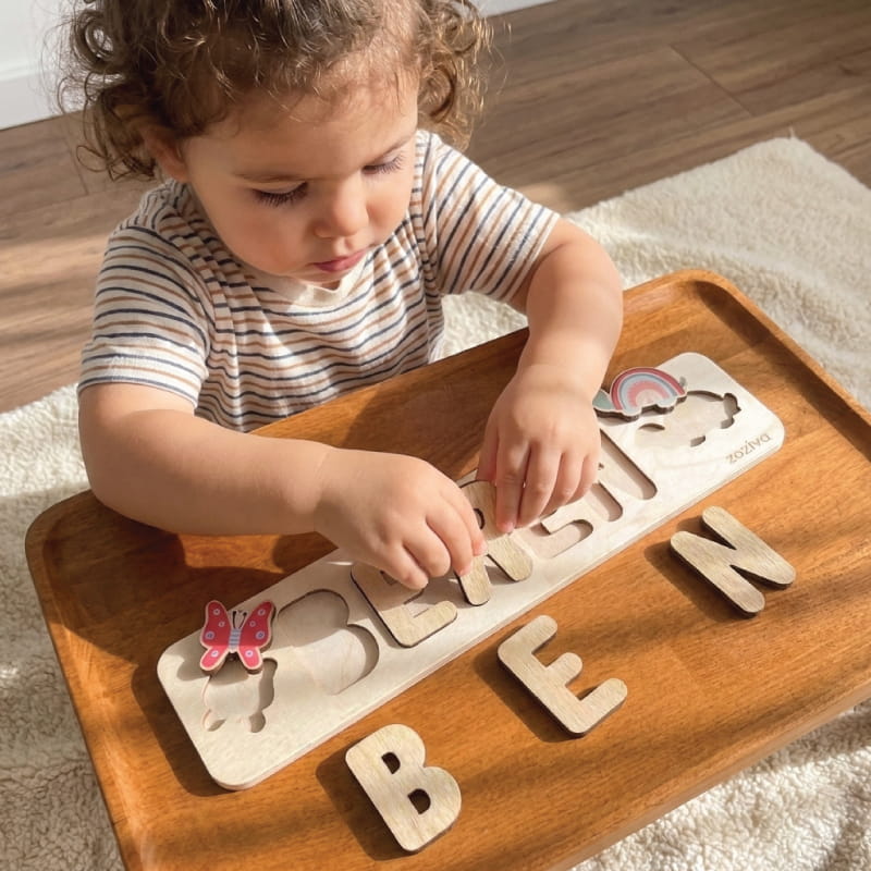 Montessori Wooden Name Puzzle Displayed in Nursery Decor