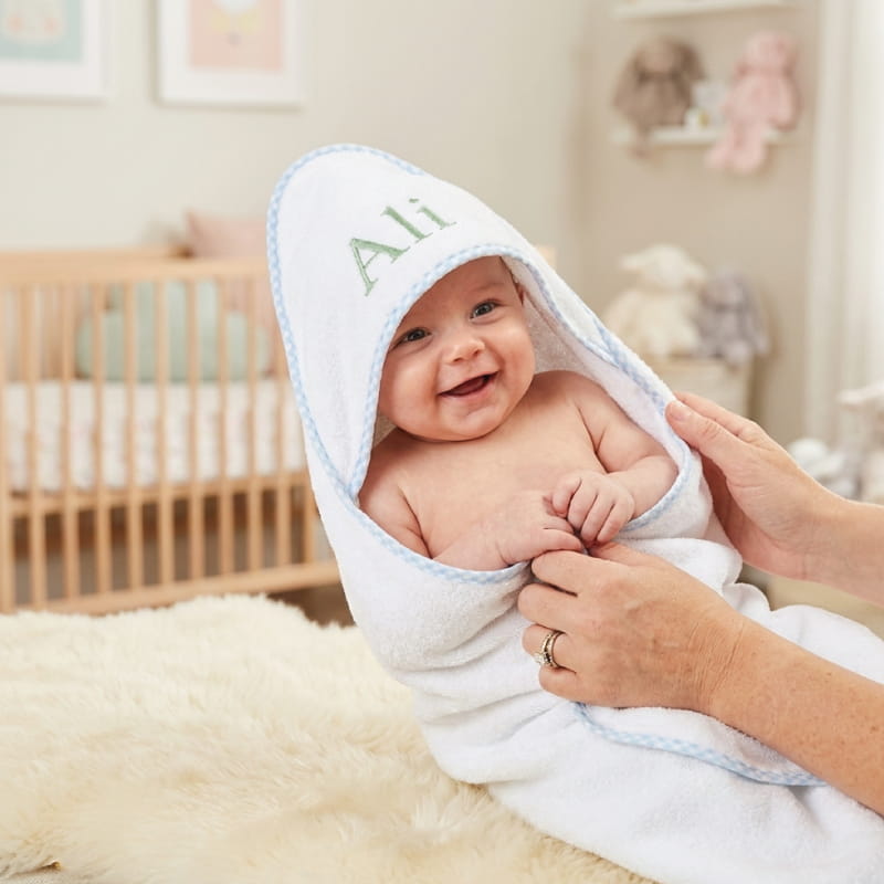 Baby wearing Custom Embroidered Bathrobe after bath