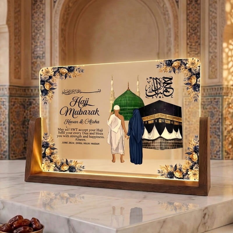 Detailed view of custom Arabic calligraphy and dua on acrylic Hajj Mubarak frame